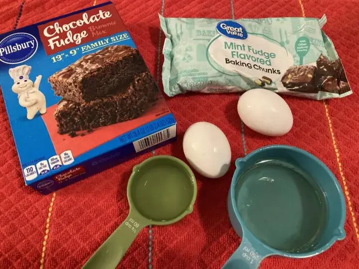 Ingredients for Mint Oreo brownies: mint chips, chocolate fudge brownie recipe, oil, water, eggs.