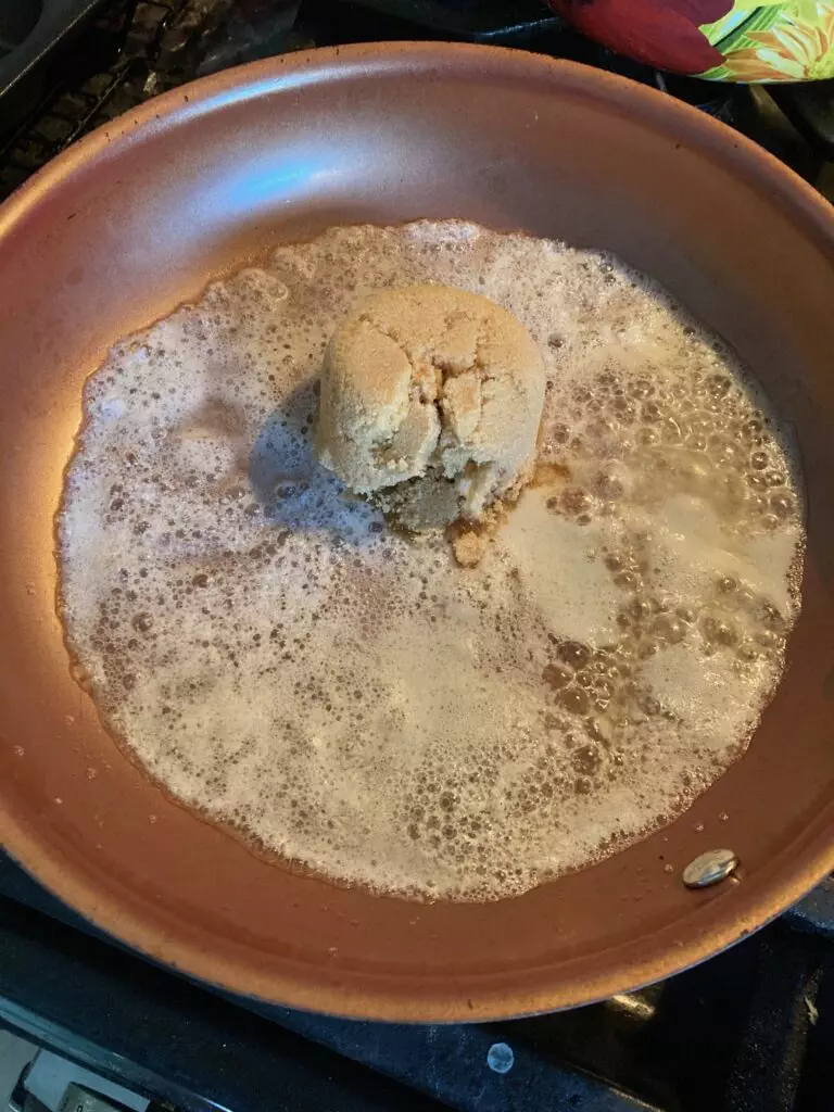 skillet with melted butter and brown sugar