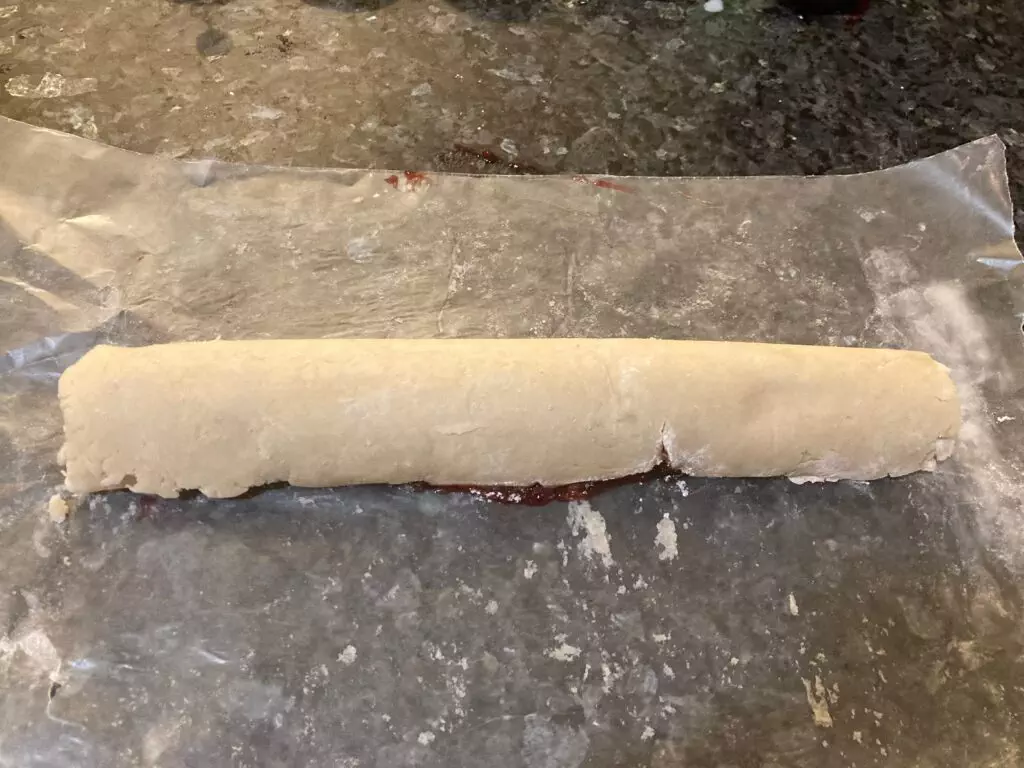 dough rolled up into a log