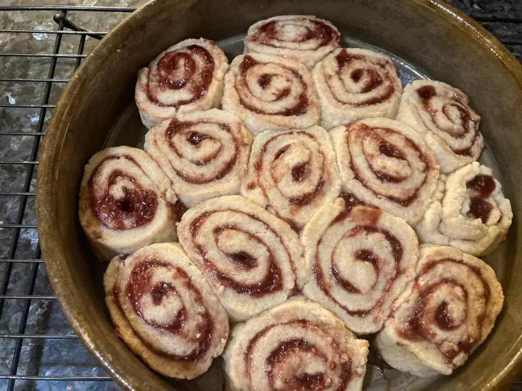 baked raspberry pinwheels in pan