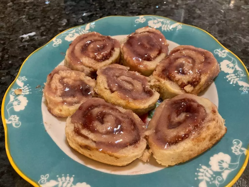 raspberry pinwheel pastries with raspberry glaze from out of the box baking.com