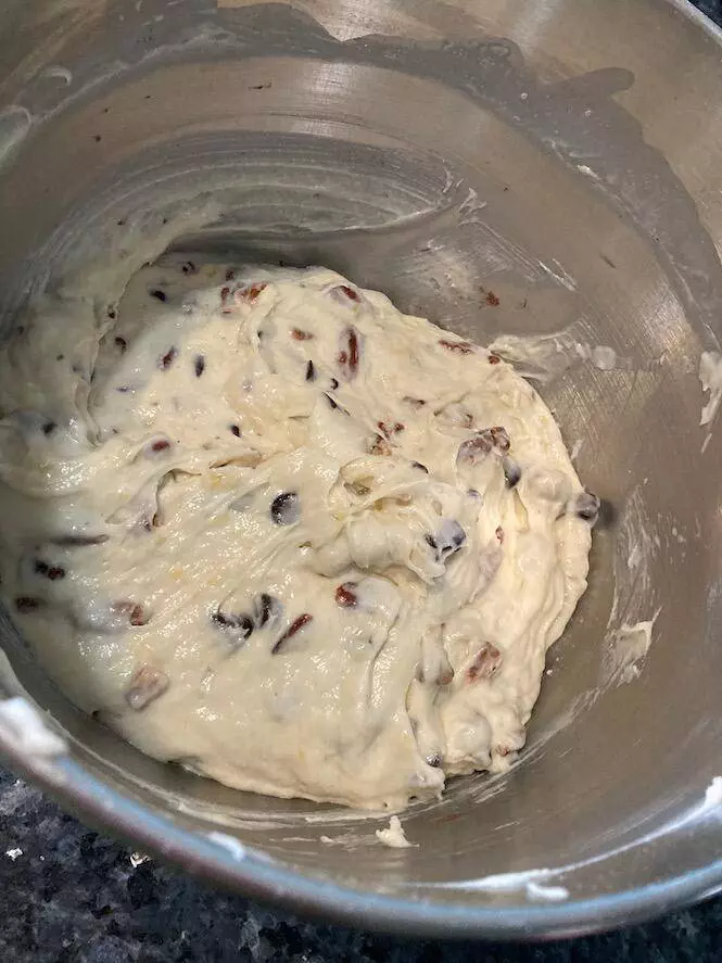 banana muffin batter with pecans and chocolate chips
