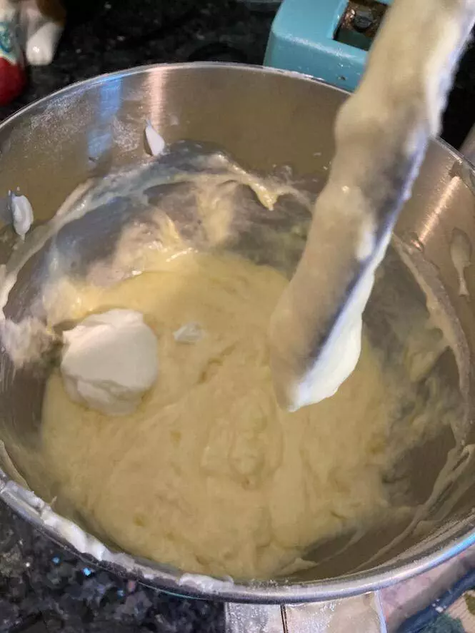 adding sour cream to mix