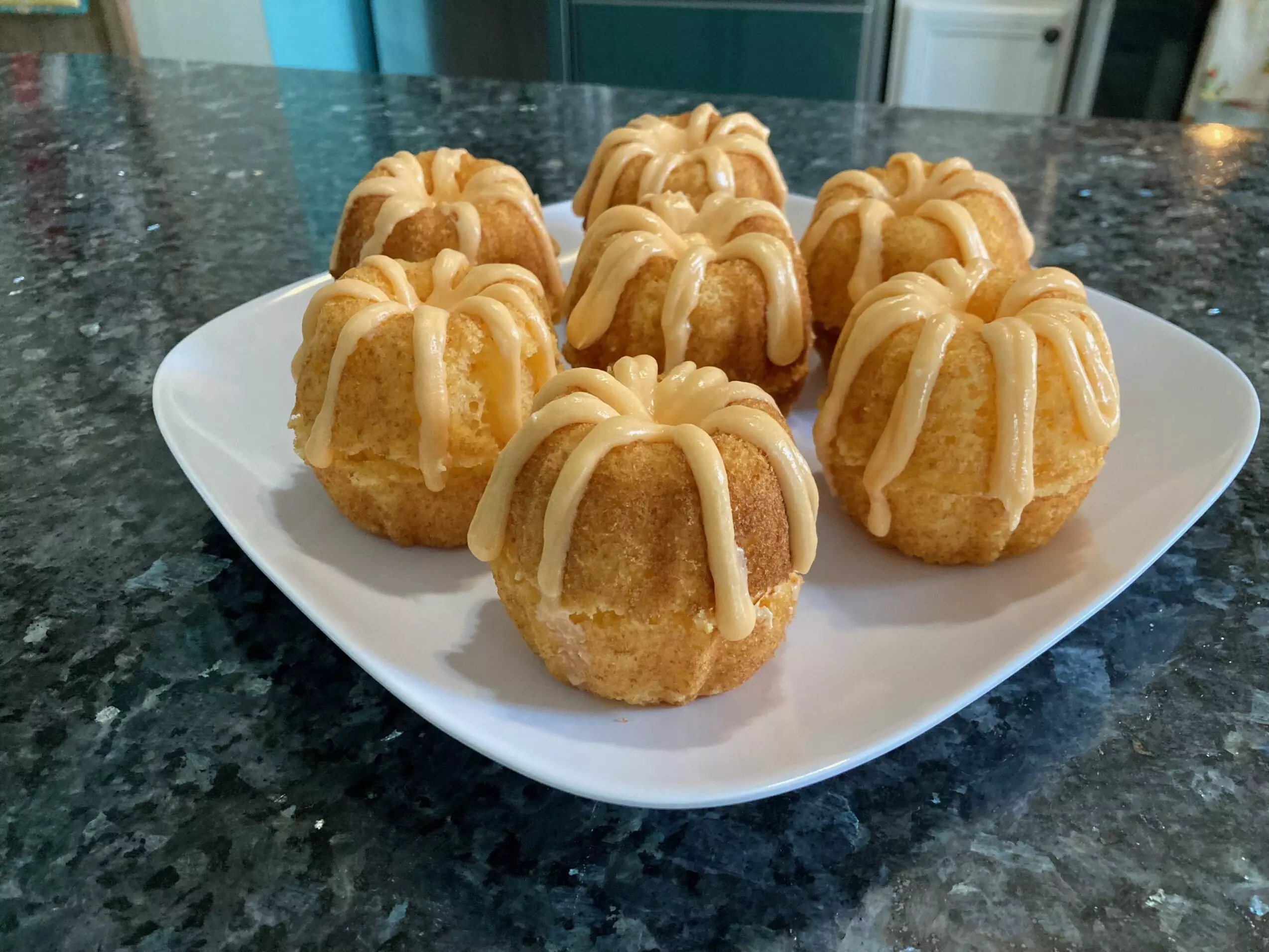 Mini bundt cake pumpkins, iced from Out of the Box Baking.com