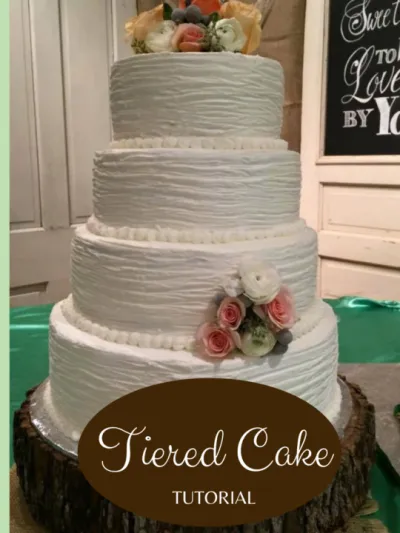 four tiered wedding cake in white