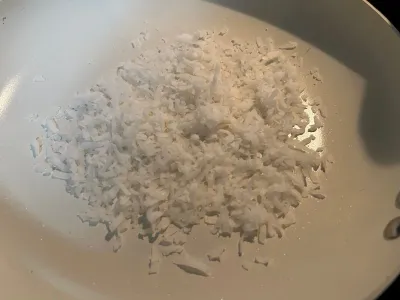 coconut flakes in skillet