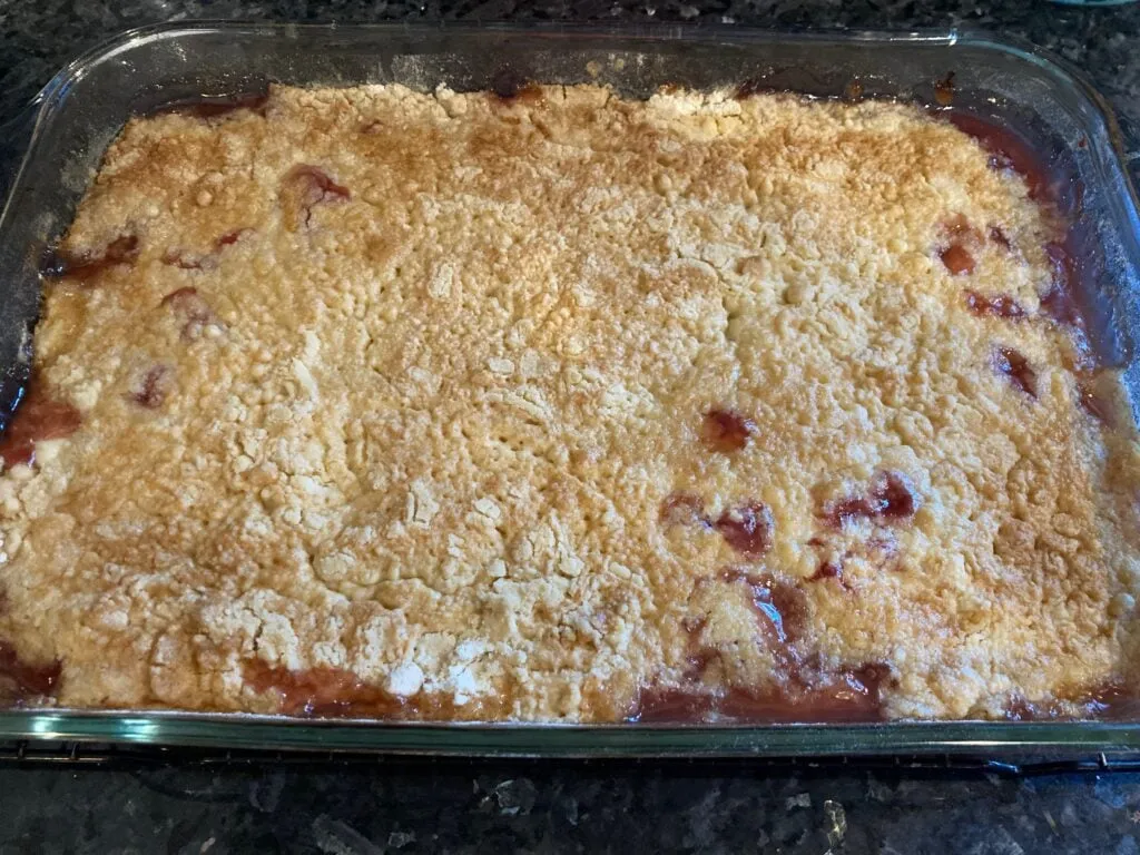 baked pineapple upside down dump cake side view