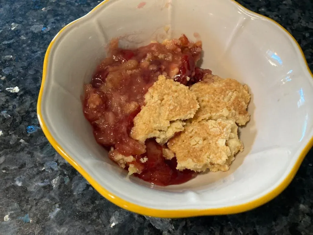 bowl of pineapple upside down dump cake