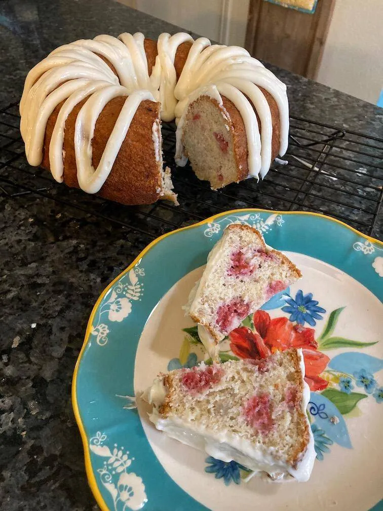 sliced banana cake with berries