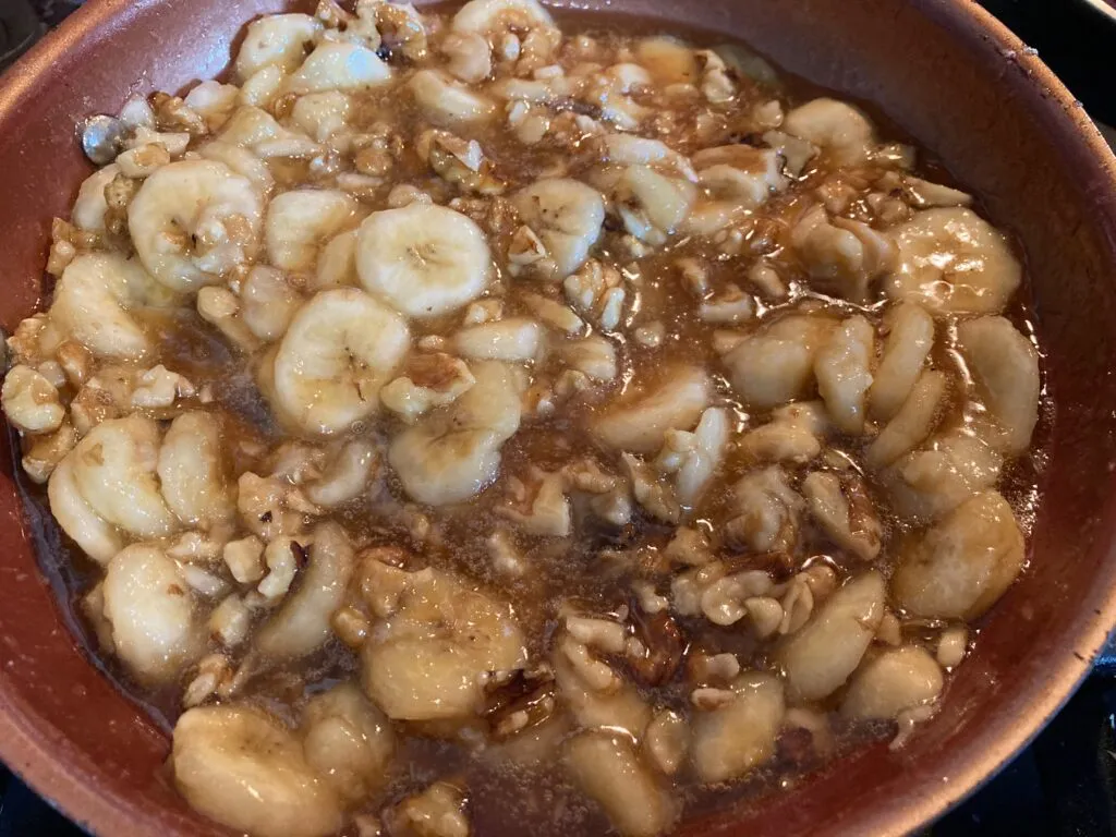 bananas, brown sugar, butter, walnuts (simmering on stove)