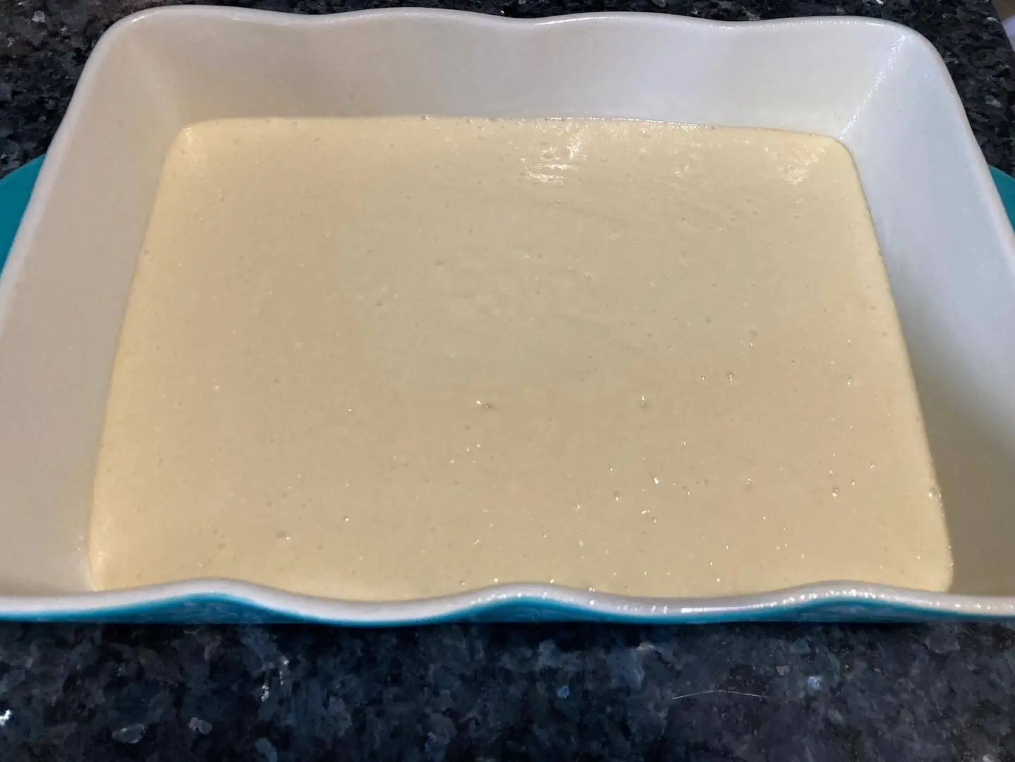 Cinnamon Roll Poke Cake from Out of the Box Baking.com
