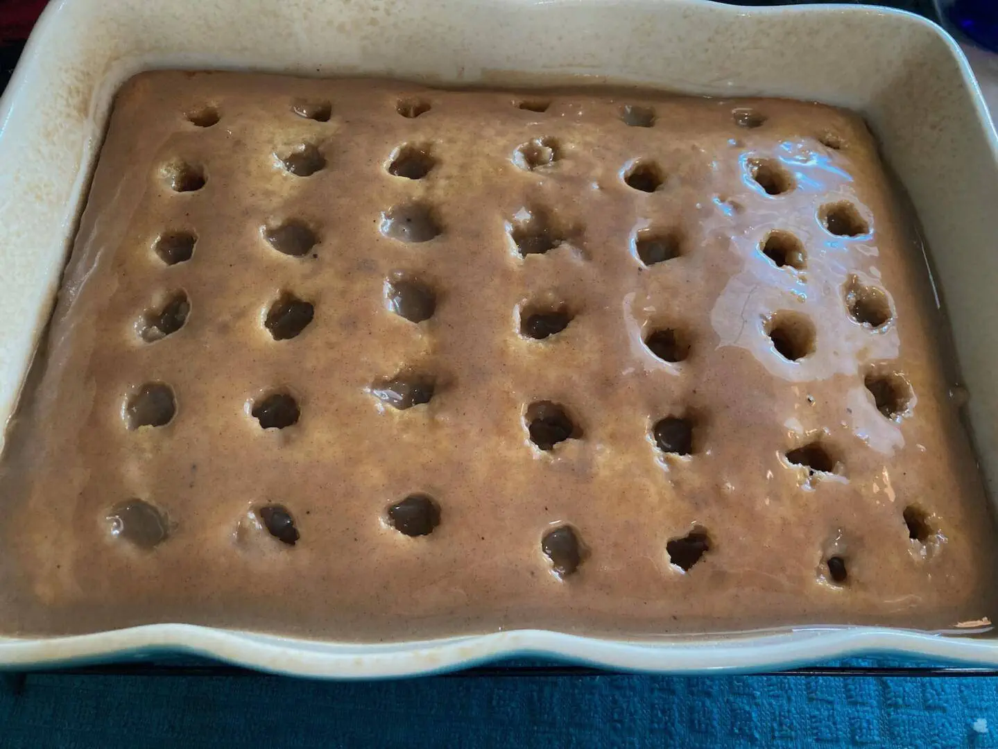 Cinnamon Roll Poke Cake from Out of the Box Baking.com